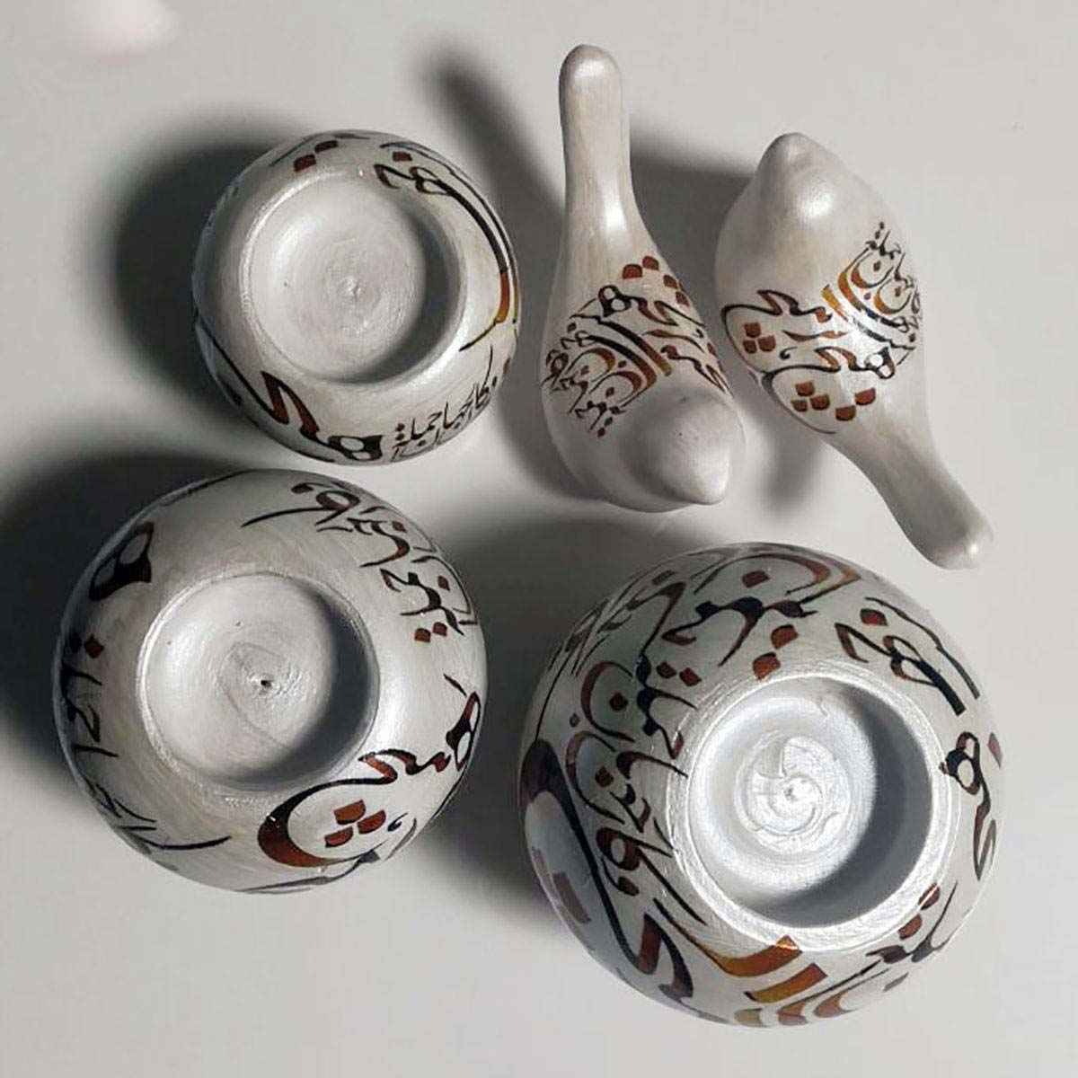 Photophore en poterie perse, modèle Calligraphie