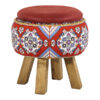 Pouf rond en velours rouge avec pieds en bois inspiré de l'art persan