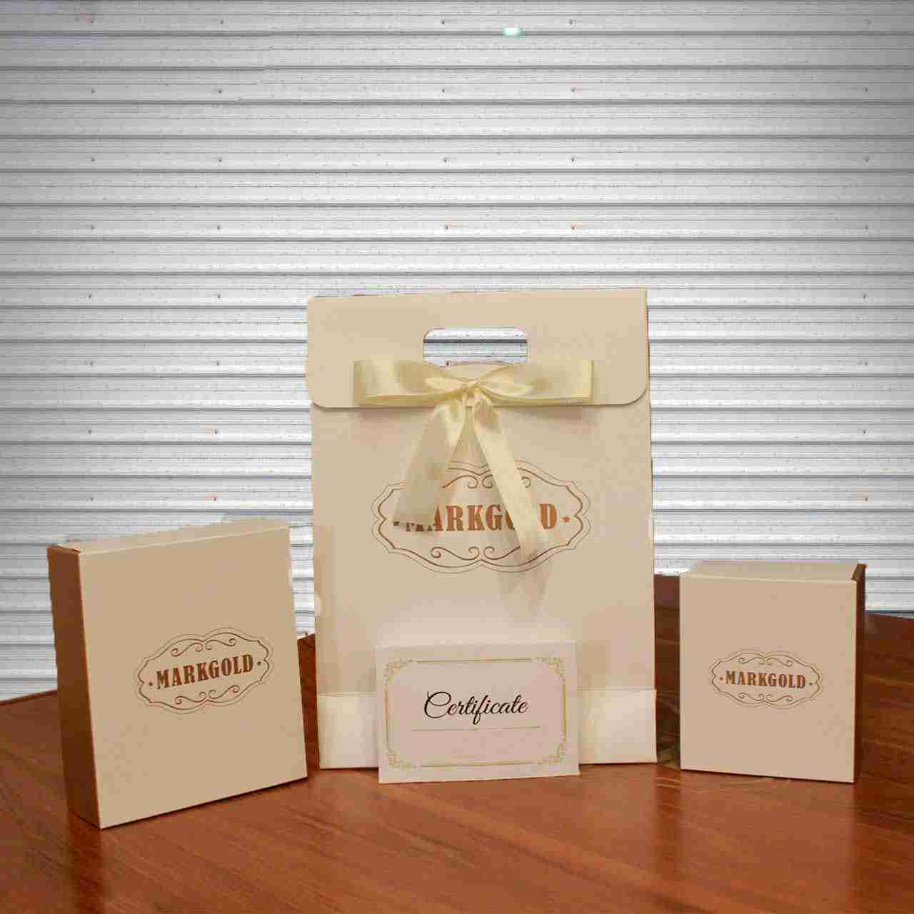 Boucles d’oreilles plaquées or avec symbole Mordad