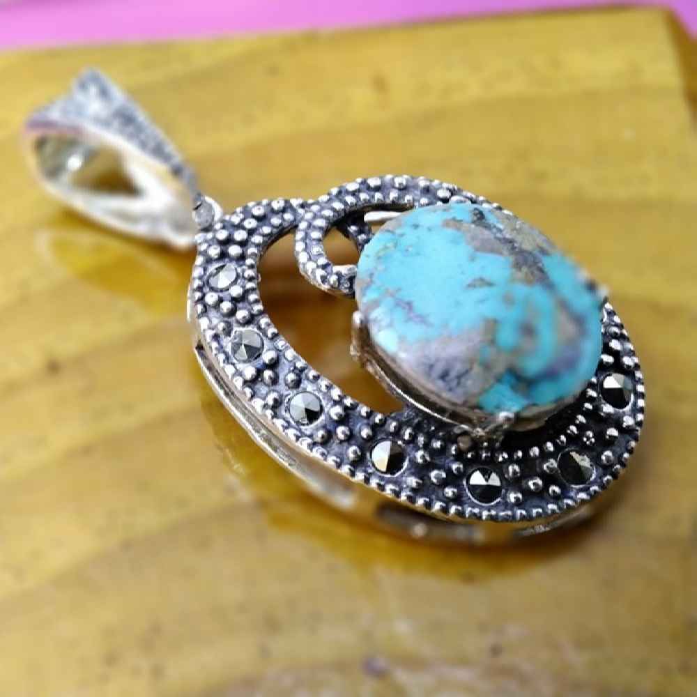 Pendentif en argent persan avec pierre précieuse Turquoise Dela