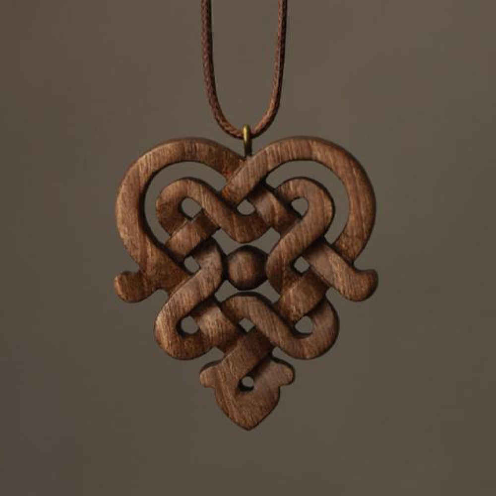 Pendentif en bois sculpté fait main avec style artistique Bava