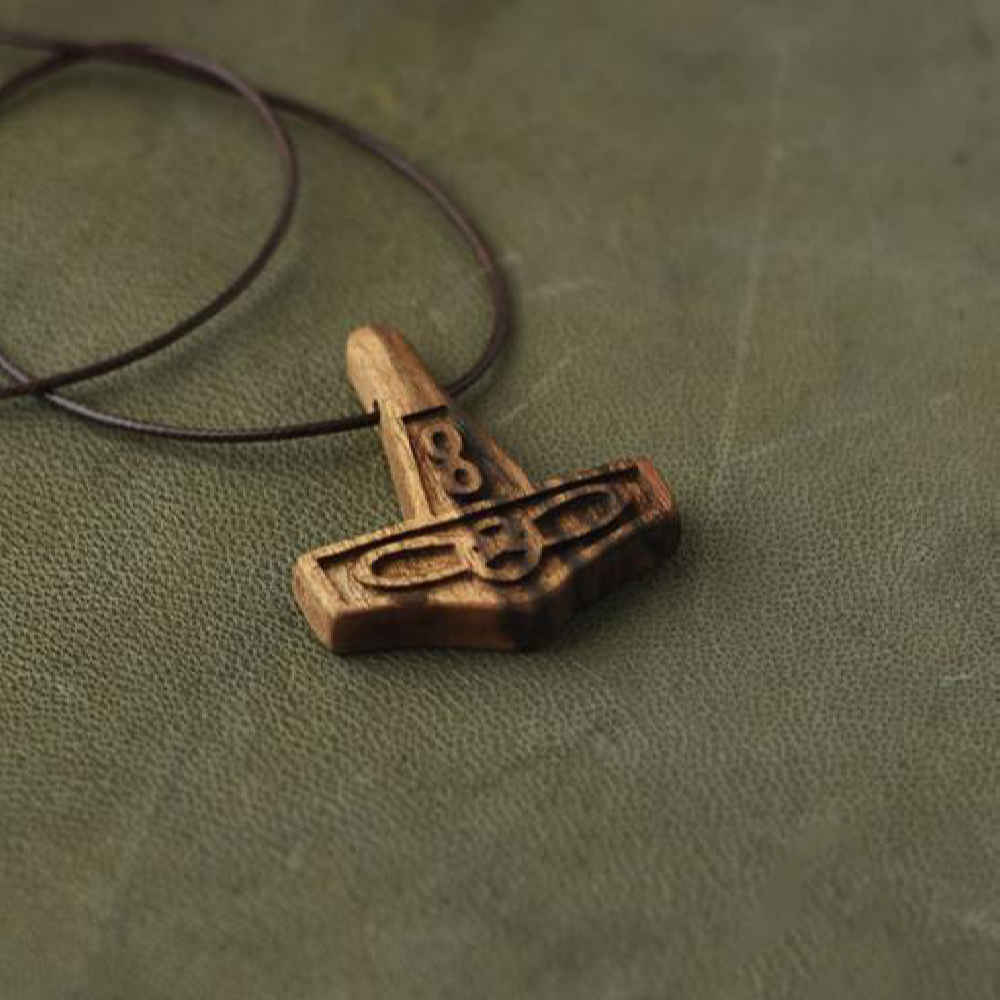 Pendentif en bois sculpté fait main avec style artistique Infini