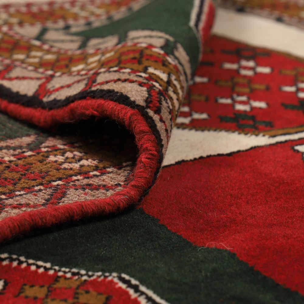 Tapis persan en laine tribal noué à la main Raika