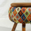 Pouf rond en velours avec pieds en bois inspiré de l'art persan marron Mahta