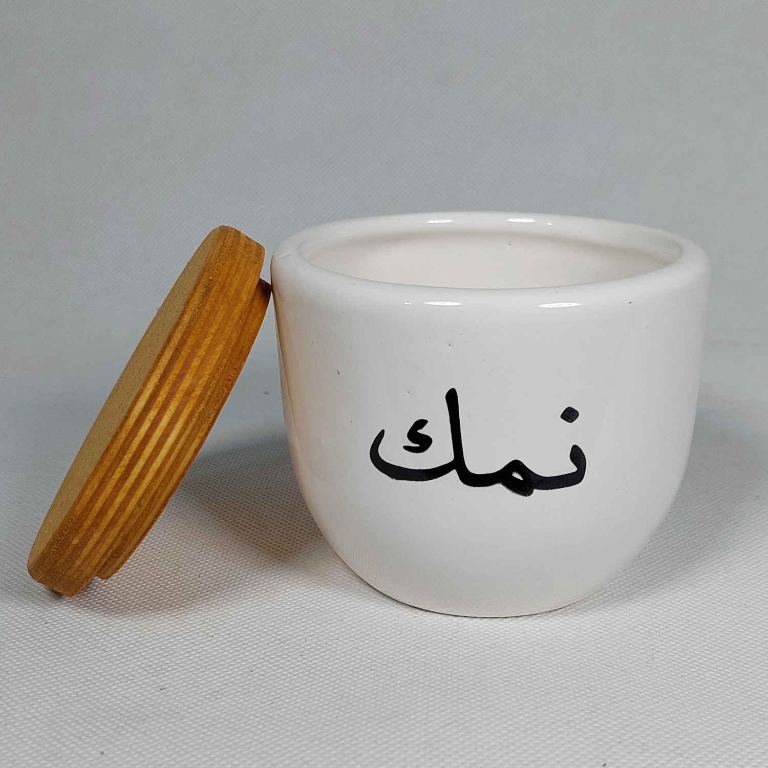 Bocal en céramique pour la cuisine Rond avec calligraphie persane Namak