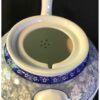 Théière de service en porcelaine blanche avec motif floral complexe Heiati