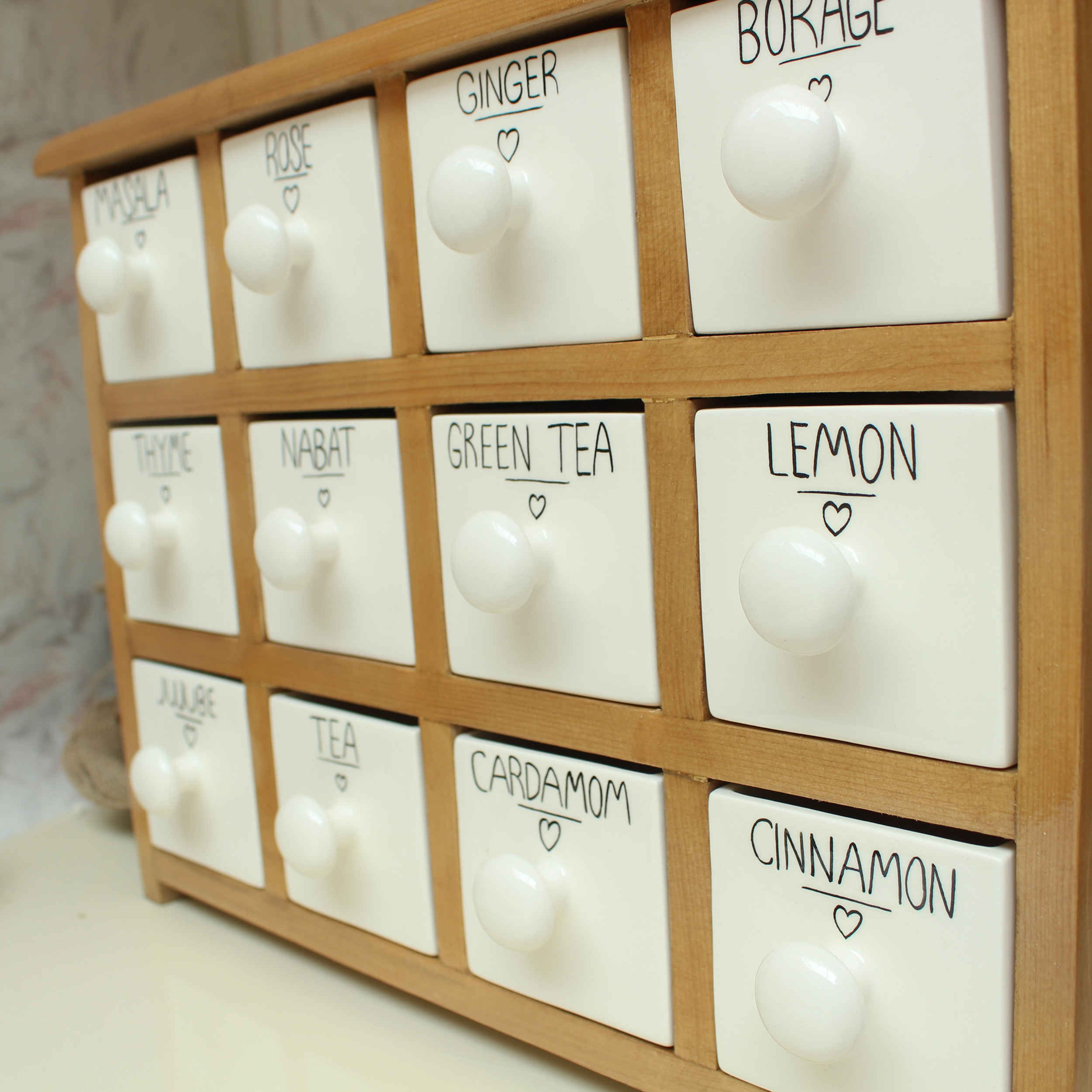 Commode en bois avec 12 tiroirs en céramique fabriquée à la main