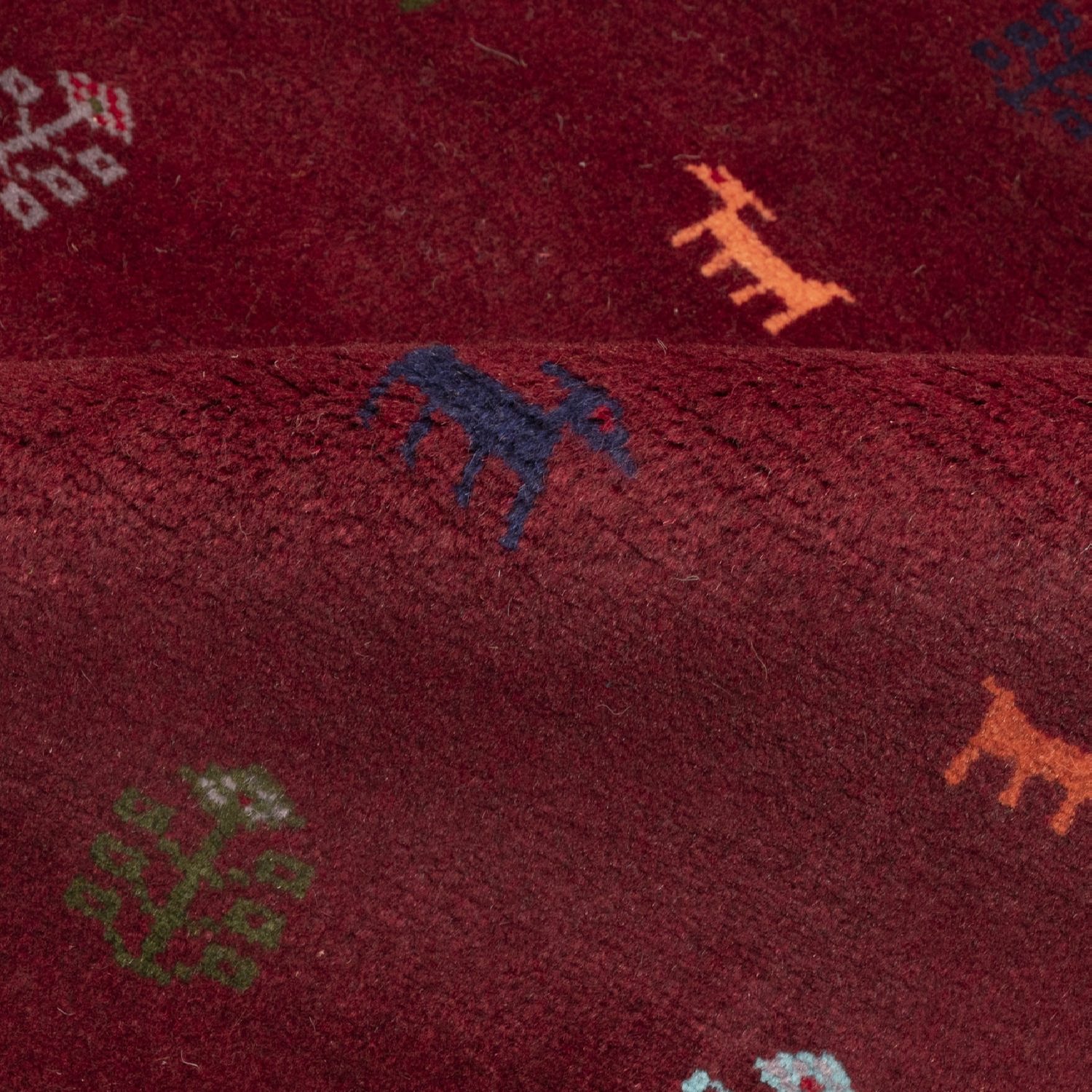 Tapis Gabbeh en laine persane authentique tissé à la main avec des motifs animaliers