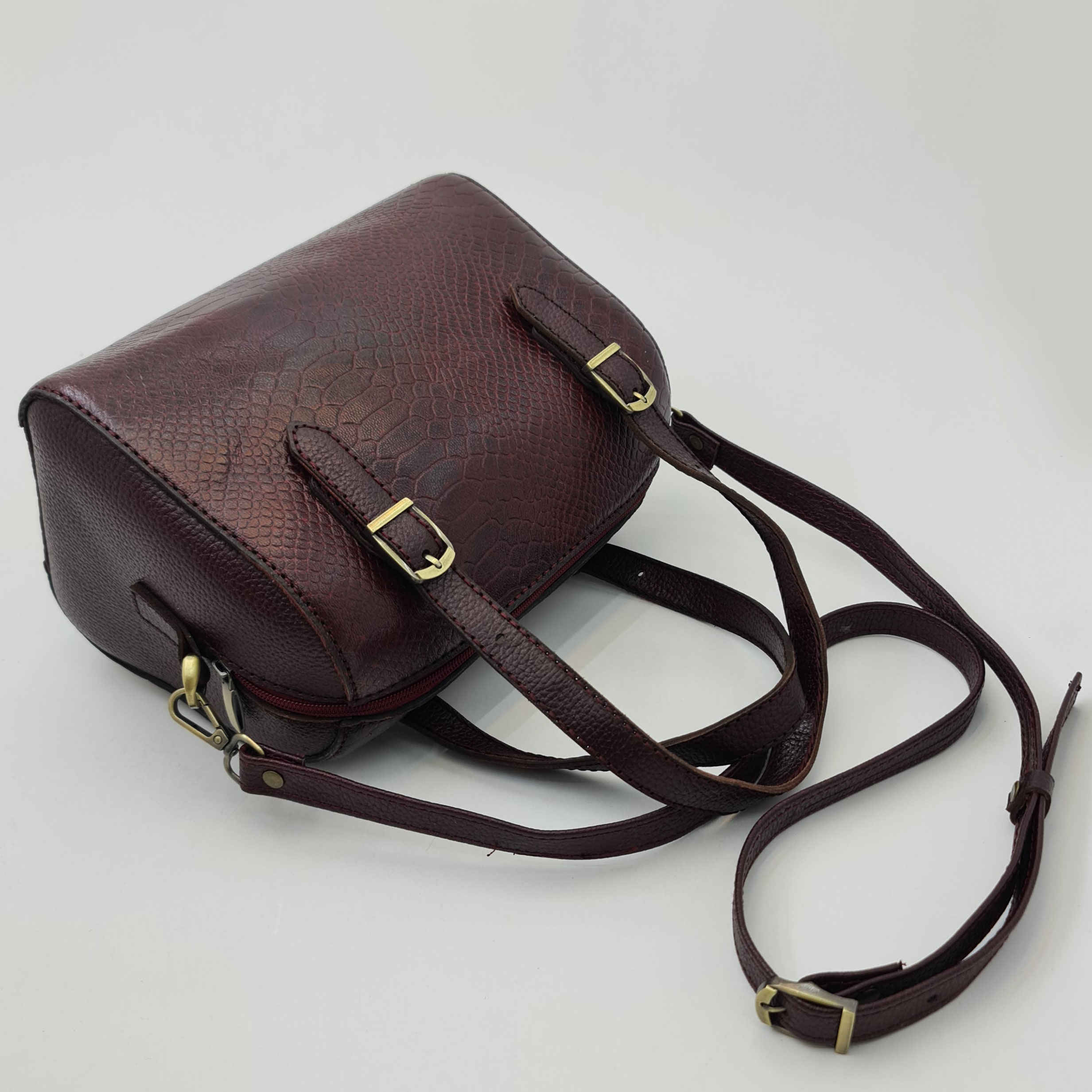 Sac à main Bauletto en cuir bordeaux avec motif peau de serpent pour femmes