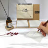 Carnet de planification mensuelle persan avec papier artisanal et bloc-notes