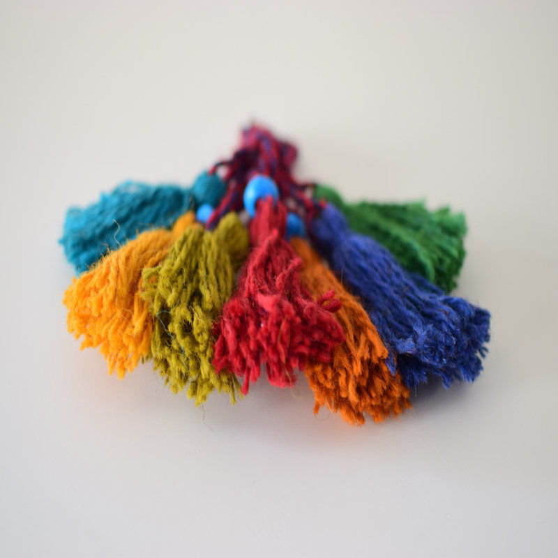 Tenture murale persane à pompons DIY – Élégance traditionnelle