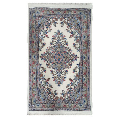 Tapis persan noué main – Médaillon floral bordé, laine grise