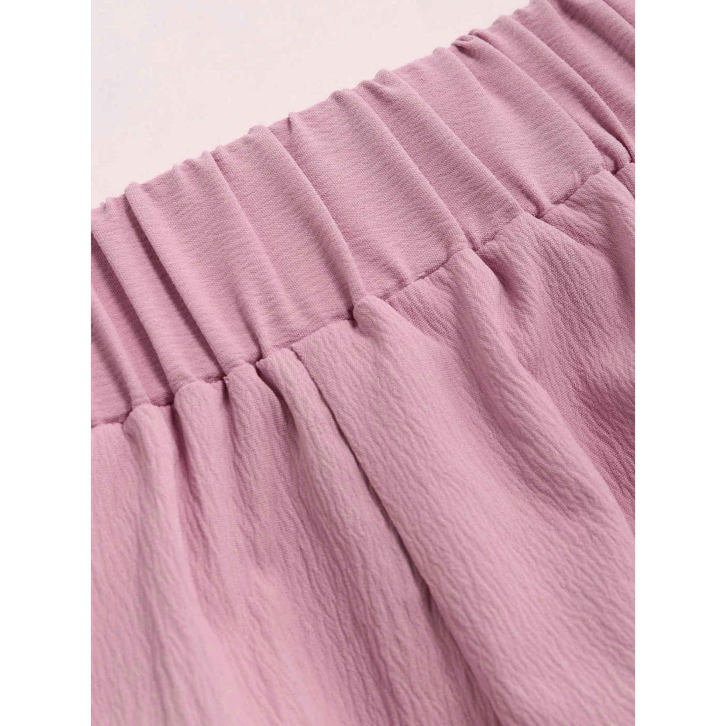 Salopette rose à épaules dénudées avec volants pour femmes