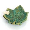 Bougeoir en poterie persane fait main avec design de feuille et oiseau