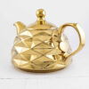 Théière en porcelaine avec design géométrique