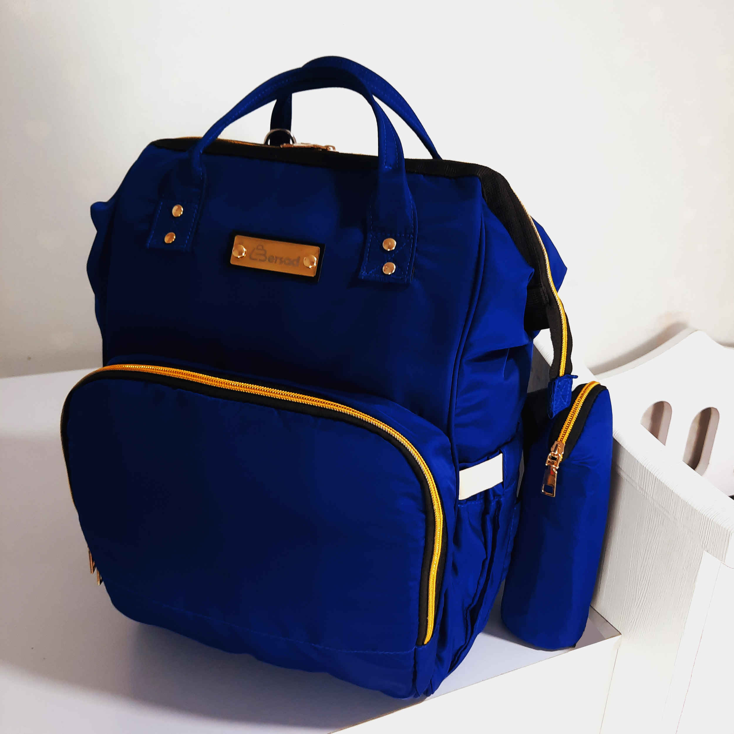 Sac à dos pour bébé avec tapis à langer intégré