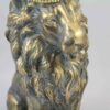 Figurine de lion assis avec couronne - Sculpture d'animal royal