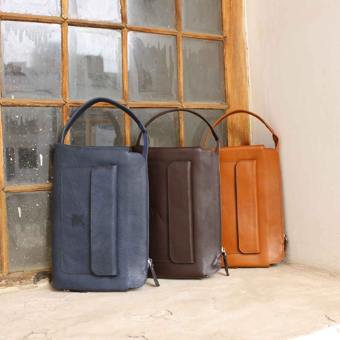 Sac à main en cuir persan, durable et chic pour hommes