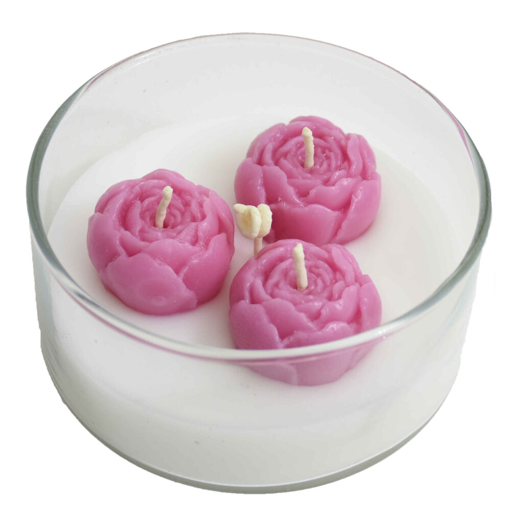 Bougie décorative en pot avec design rose en rose