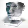 Sculpture en béton décoratif vase avec design de visage