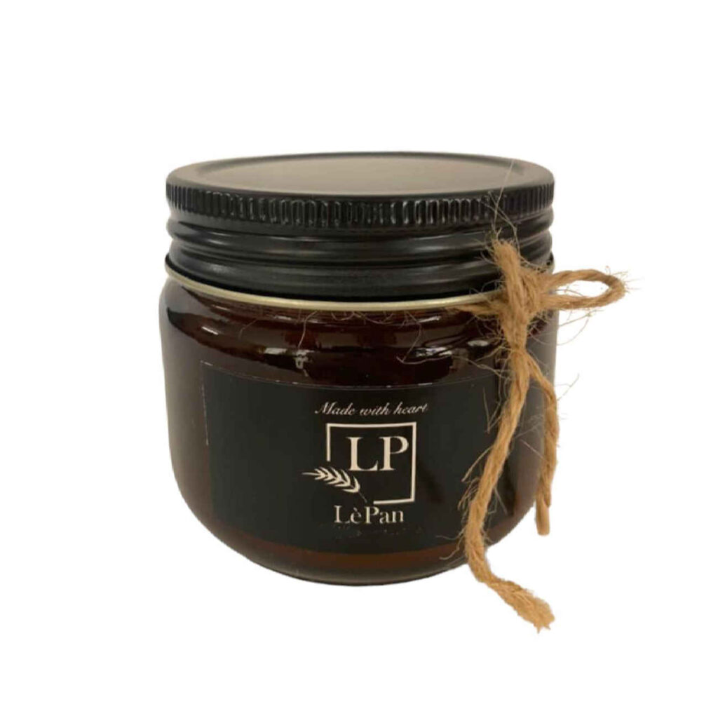 Bougie parfumée en pot marron avec parfum café