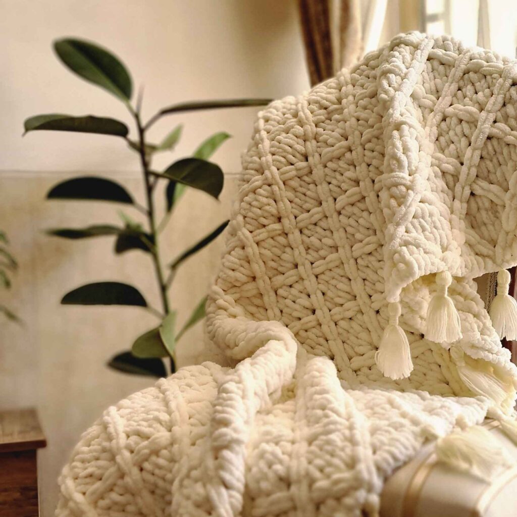 Plaid Tricoté Tendance – Doux, Chaud et Élégant pour le Salon
