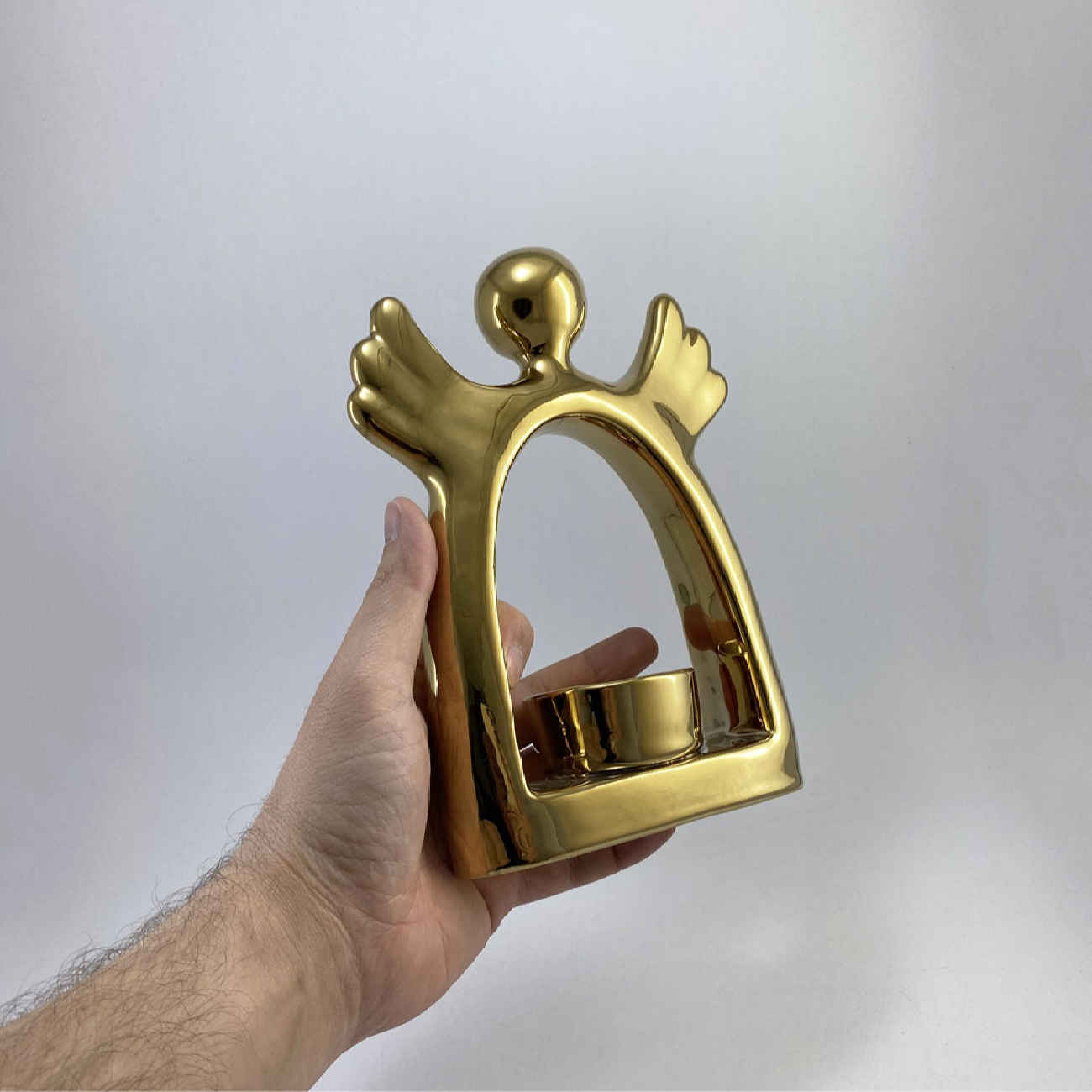 Porte-bougie décoratif en céramique avec design d’ange en or