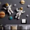 Statue d'astronaute murale : Pièce décorative unique à thème spatial pour votre maison ou bureau