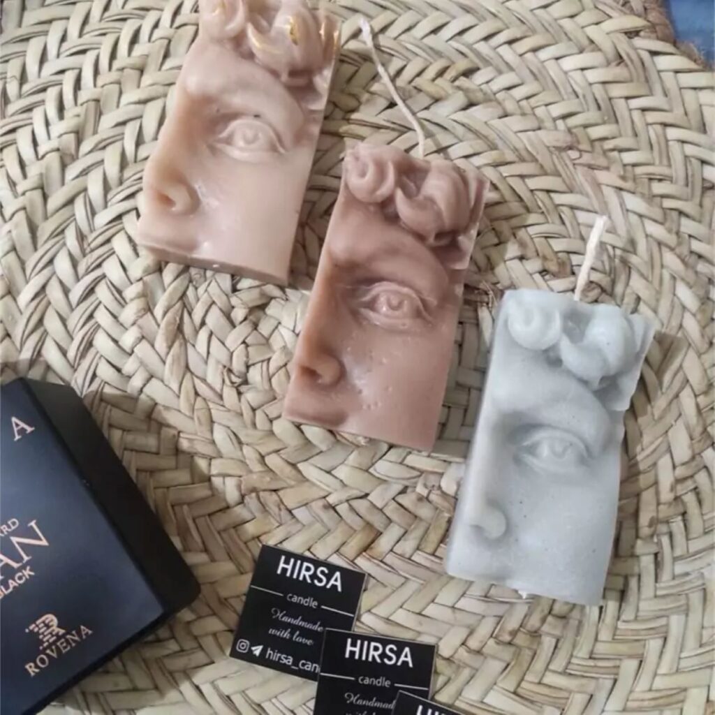 Bougie visage humain, une touche d'art et de lumière