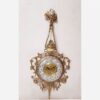 Charming-Brass-Wall-Clock-with-Decorative-Floral-Accents-and-Hanging-Detail-2