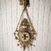 Grande horloge murale suspendue en laiton avec pendentif floral